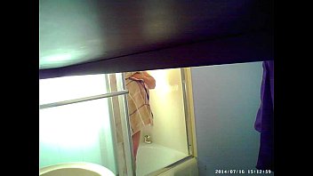 Son sets up spycam in shower to see mom's huge tits