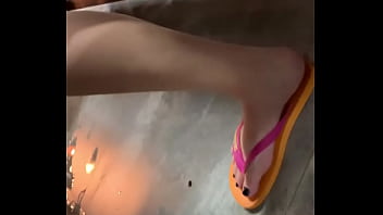 My girlfriend feet in blacknails at a party